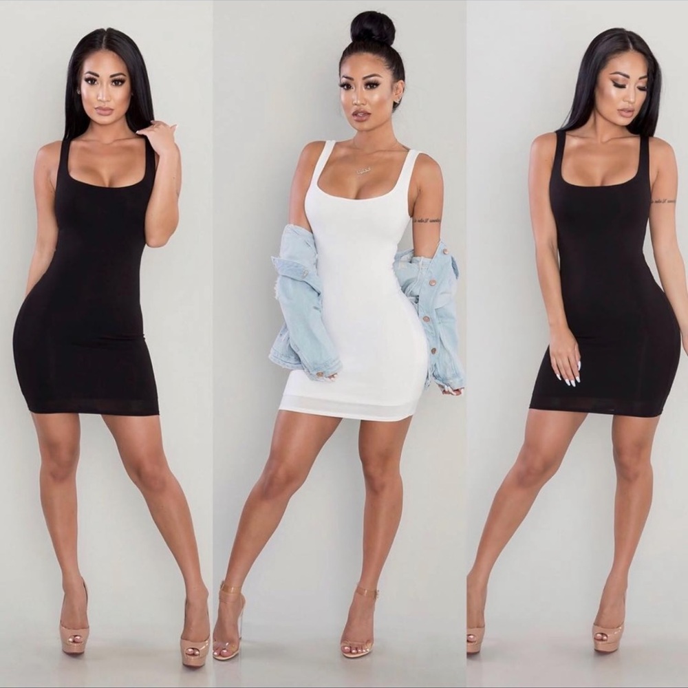 BRAND NEW WITH TAGS DOUBLE LINED MINI DRESS!